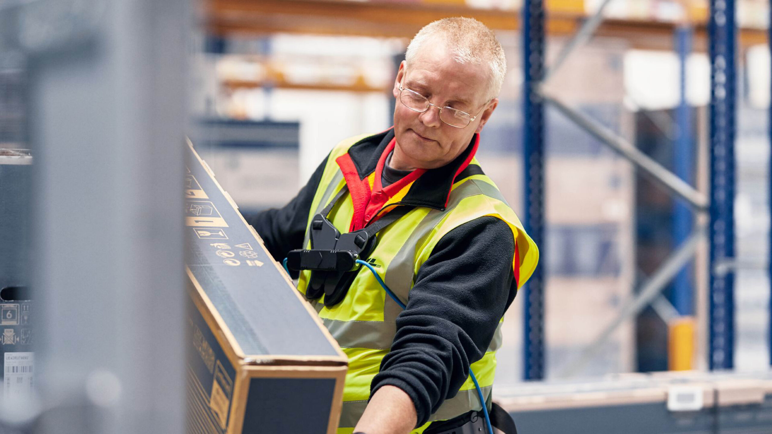 DHL Employee with Exoskeleton