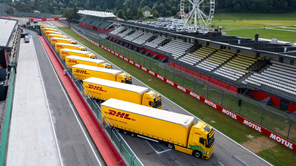 DHL trucks on the racetrack