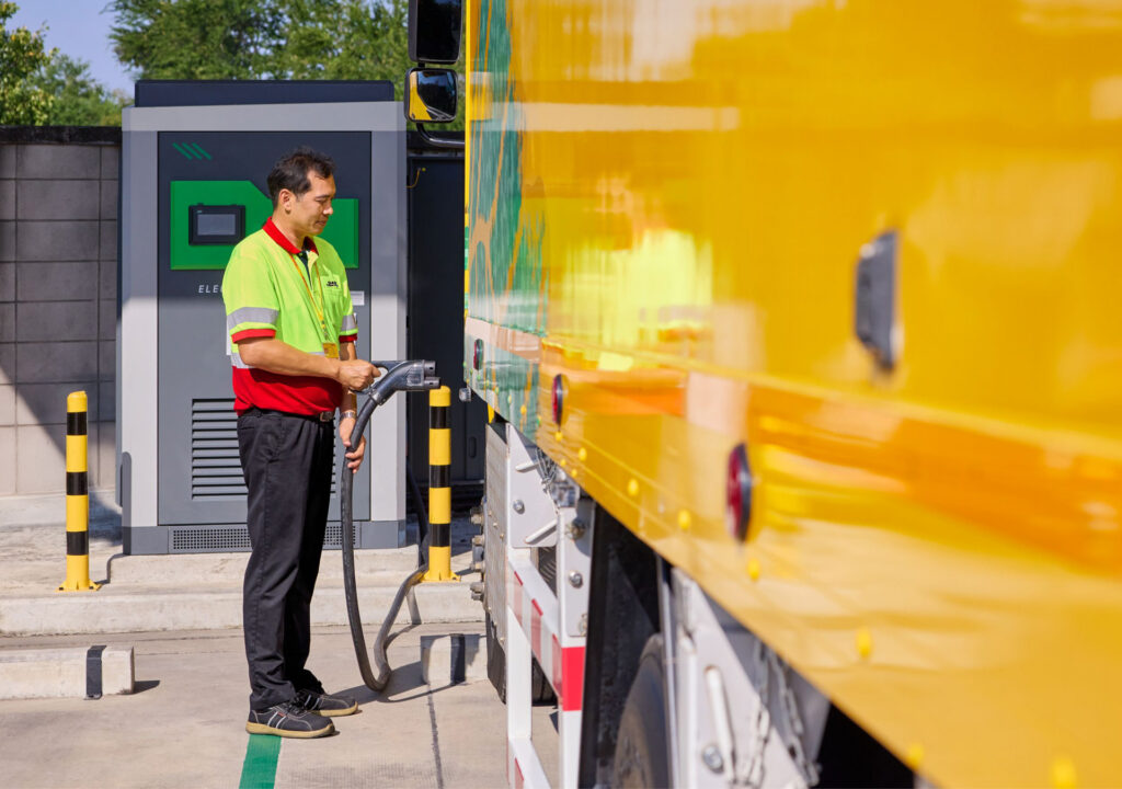 An electric truck is being charged